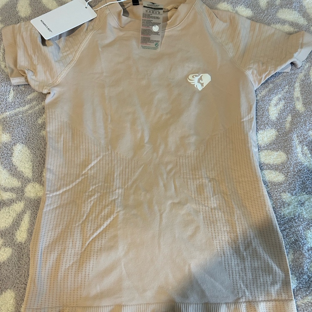 Women’s best baby pink  workout t-shirt . New with tags